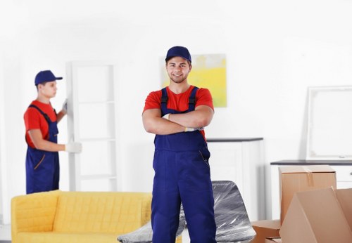 Office relocation planning in Clerkenwell with moving boxes and office furniture