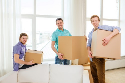 Careful handling of household items during a flat move in Clerkenwell