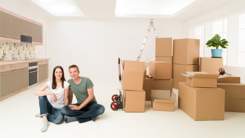 Moving team handling boxes and furniture near Clerkenwell flats